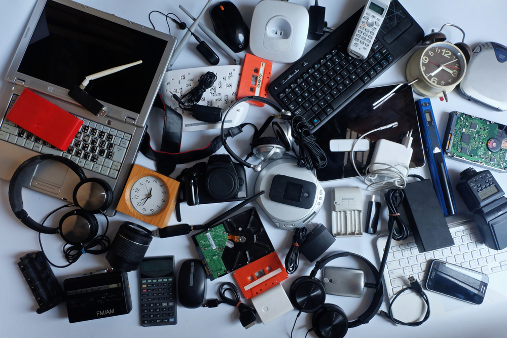 Pile of old electronics that need to be recycled or donated